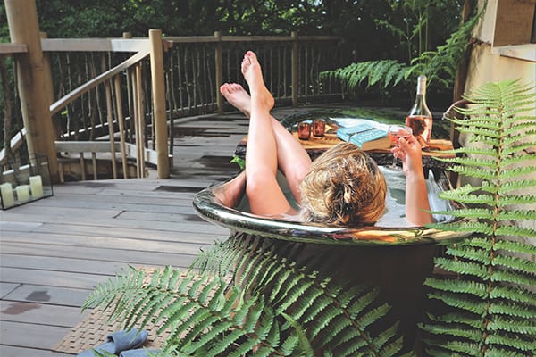 Outdoor bath at The Hudnalls Hideout Treehouse, Wye Valley