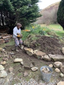 Simon-learnt-how-to-dry-stone-wall-from-watching-youtube-videos-then-repaired-the-walls-around-the-castle-and-built-this-herb-garden-for-castle-breakfasts